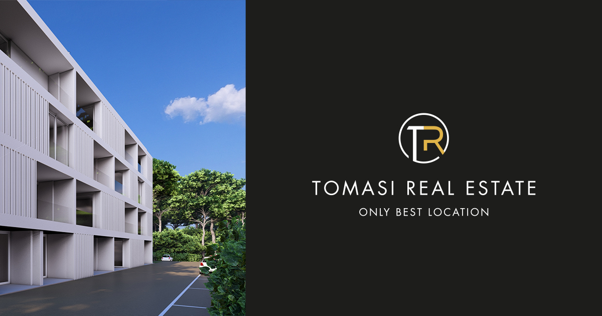 Logo Tomasi Real Estate S.r.l.